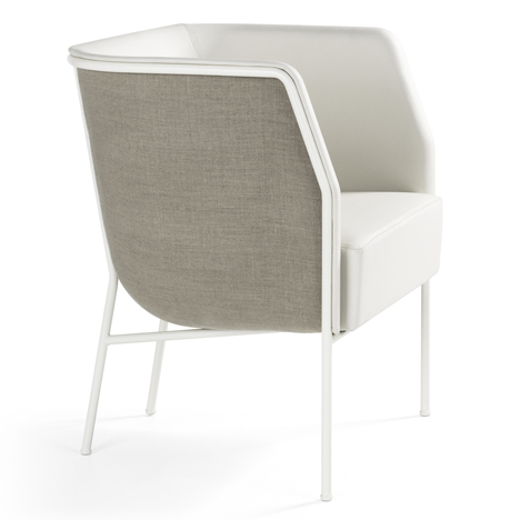 Cajal sofas and armchair by Gunilla Allard balance the seat on a thin metal frame