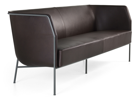 Cajal sofas and armchair by Gunilla Allard balance the seat on a thin metal frame