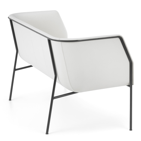 Cajal sofas and armchair by Gunilla Allard balance the seat on a thin metal frame