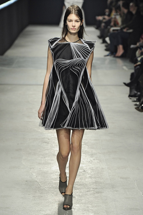 Outlined silk layers cover dresses by Christopher Kane