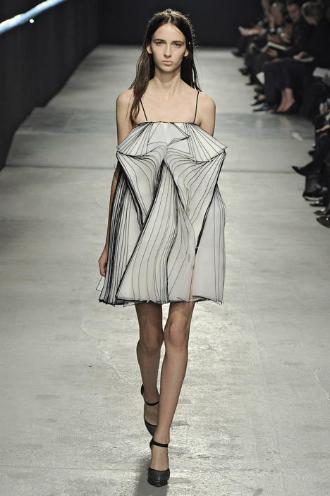 Outlined silk layers cover dresses by Christopher Kane