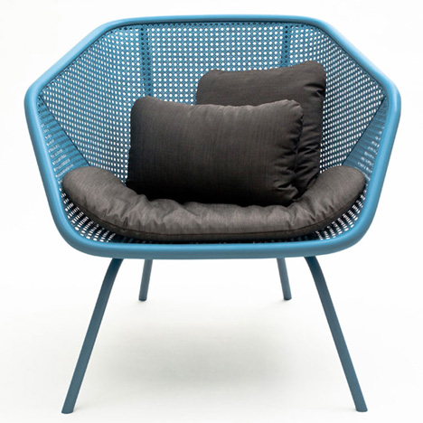 Colony armchair by Skrivo mixes steam-bent wood and rattan