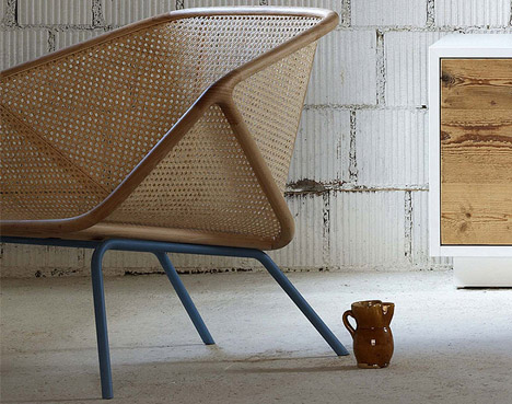 Colony armchair by Skrivo mixes steam-bent wood and rattan