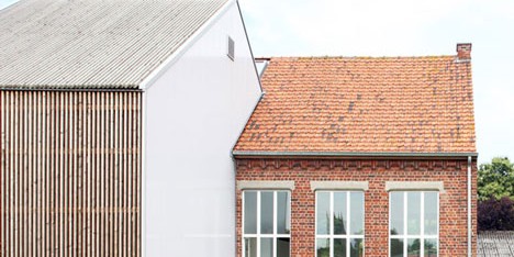 Community Centre Woesten by Atelier Tom Vanhee has a contrasting gabled extension