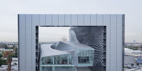 Emerson College campus by Morphosis places curvy classrooms within a hollow frame