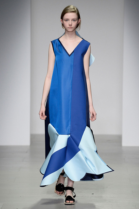Giant flowers in Ondrej Adamek's graduate fashion collection obscure models