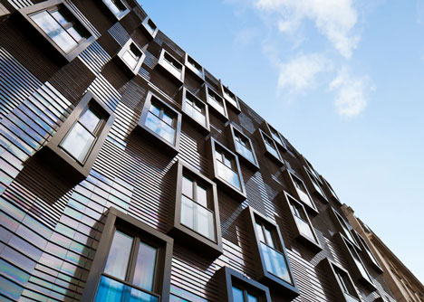 Périphériques upgrades Paris plot with contrasting apartment blocks and a colourful kindergarten