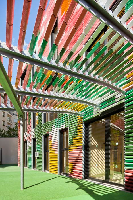Périphériques upgrades Paris plot with contrasting apartment blocks and a colourful kindergarten