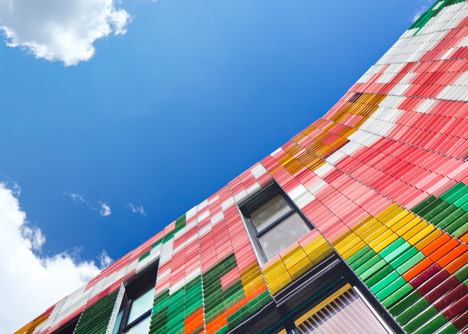 Périphériques upgrades Paris plot with contrasting apartment blocks and a colourful kindergarten