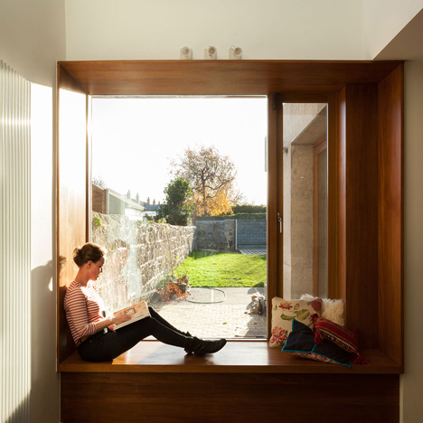 House extension by GKMP Architects includes a wooden window seat