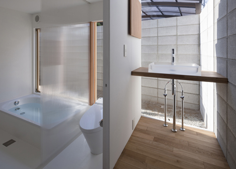 House in Kawanishi by Tato Architects based on Australia's "Queenslander" dwellings