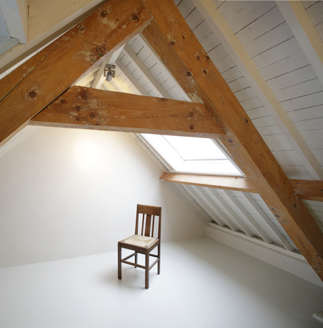 Unknown Architects updates 200-year-old house with twisting staircase and wooden furniture