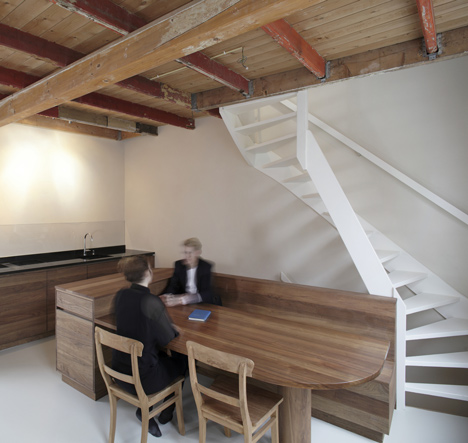 Unknown Architects updates 200-year-old house with twisting staircase and wooden furniture