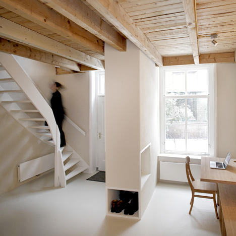 Unknown Architects updates 200-year-old house with twisting staircase and wooden furniture