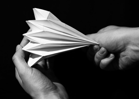 Folded metal kiosks by Make open like a paper fan