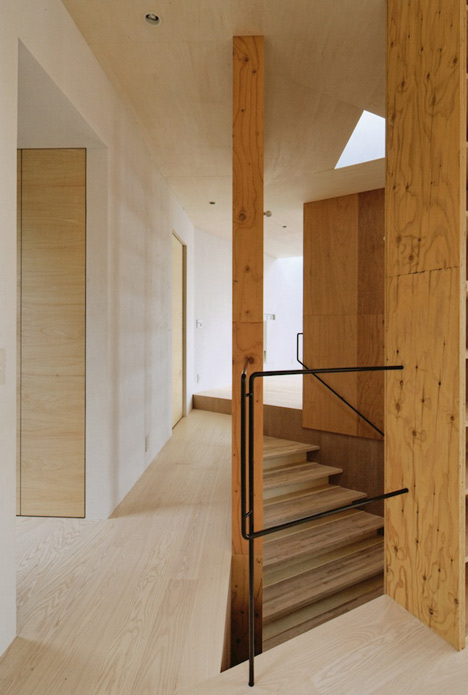 Krampon house by Shogo Aratani climbs over a rocky site