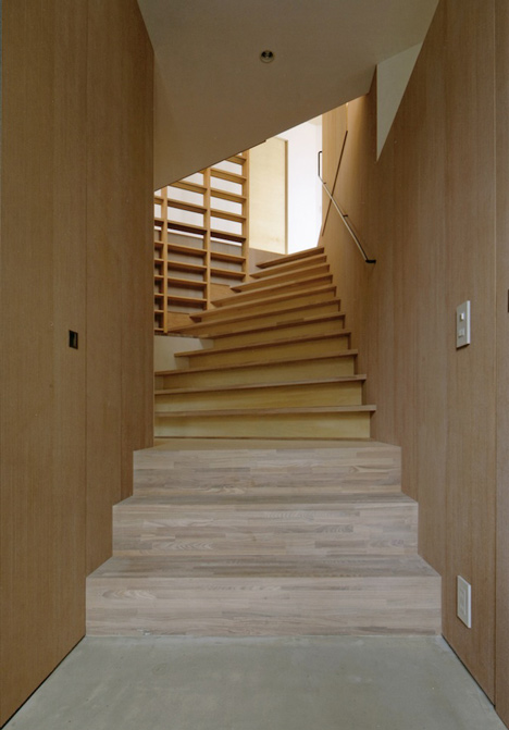 Krampon house by Shogo Aratani climbs over a rocky site
