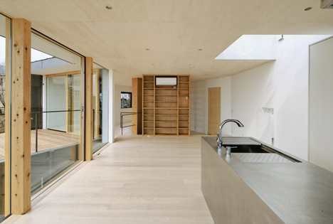 Krampon house by Shogo Aratani climbs over a rocky site