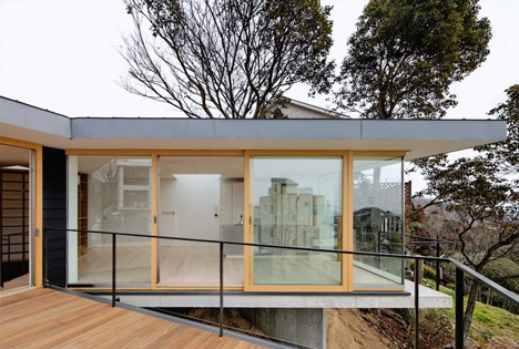 Krampon house by Shogo Aratani climbs over a rocky site