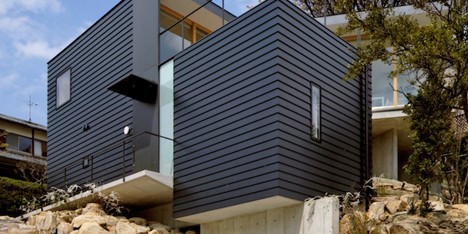 Krampon house by Shogo Aratani climbs over a rocky site