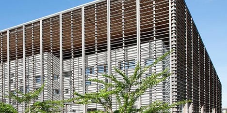 University library by RH+ Architecture encased within a timber lattice