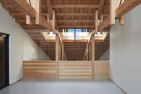 O Pharmacy by Ninkipen! features exposed wooden ceiling