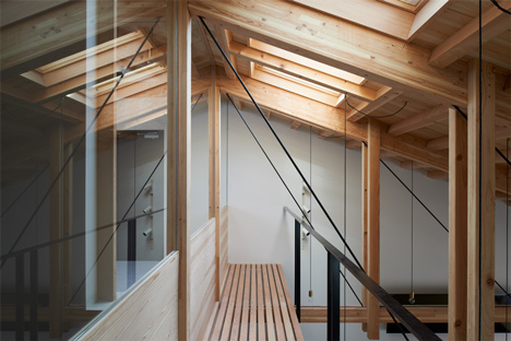 O Pharmacy by Ninkipen! features exposed wooden ceiling