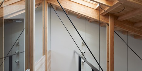 O Pharmacy by Ninkipen! features exposed wooden ceiling