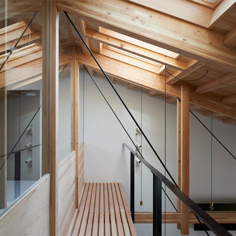 O Pharmacy by Ninkipen! features exposed wooden ceiling