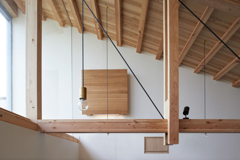 O Pharmacy by Ninkipen! features exposed wooden ceiling
