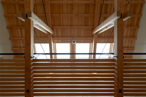 O Pharmacy by Ninkipen! features exposed wooden ceiling