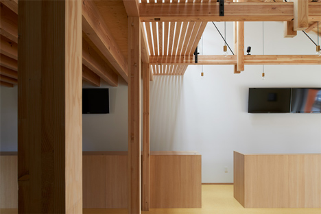 O Pharmacy by Ninkipen! features exposed wooden ceiling