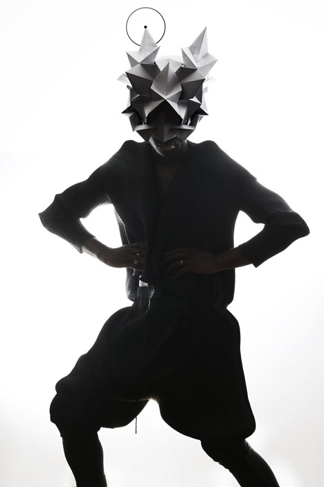 Origami headgear folded to resemble mythological creatures