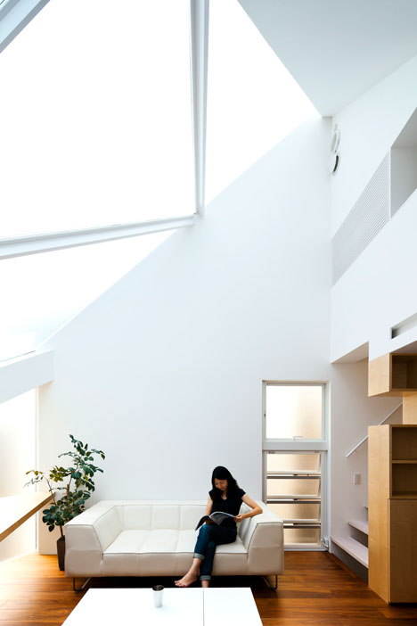 Tokyo house by Atelier Tekuto with skylight designed to "frame the sky"