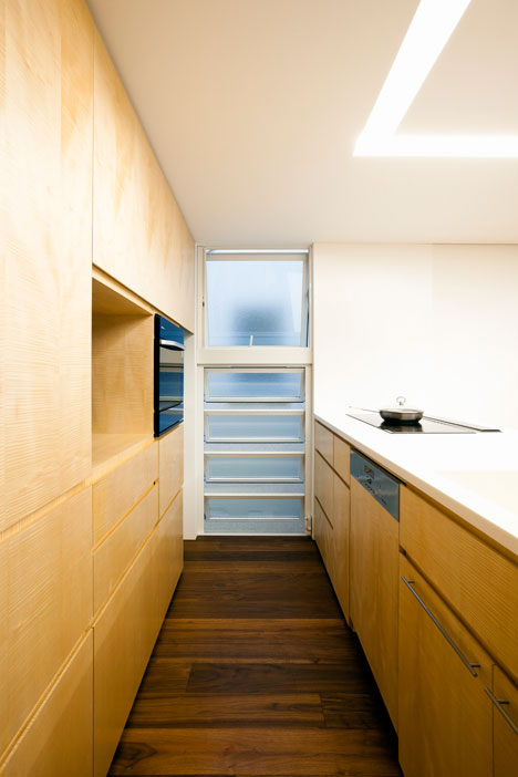 Tokyo house by Atelier Tekuto with skylight designed to "frame the sky"
