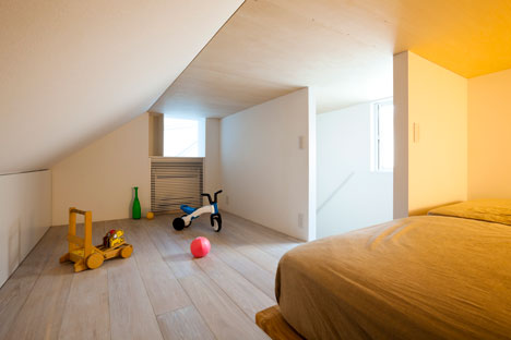 Tokyo house by Atelier Tekuto with skylight designed to "frame the sky"