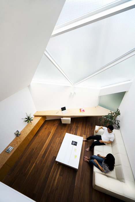 Tokyo house by Atelier Tekuto with skylight designed to "frame the sky"