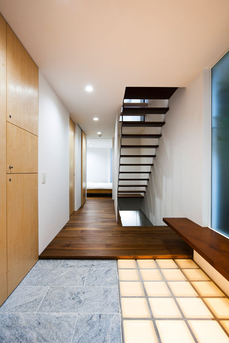 Tokyo house by Atelier Tekuto with skylight designed to "frame the sky"