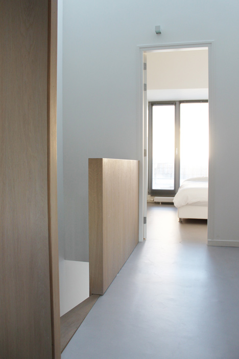 8A Architecten renovate house with combined staircase and sofa