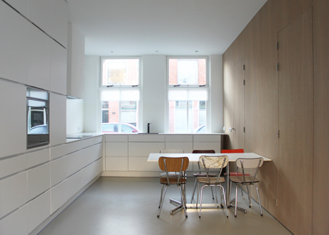8A Architecten renovate house with combined staircase and sofa