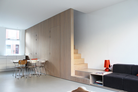 8A Architecten renovate house with combined staircase and sofa