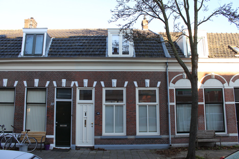 8A Architecten renovate house with combined staircase and sofa