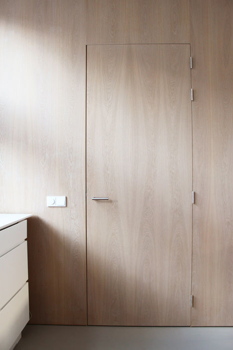 8A Architecten renovate house with combined staircase and sofa