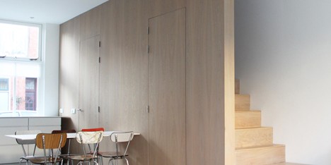 8A Architecten renovate house with combined staircase and sofa