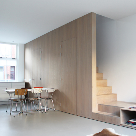 8A Architecten renovate house with combined staircase and sofa