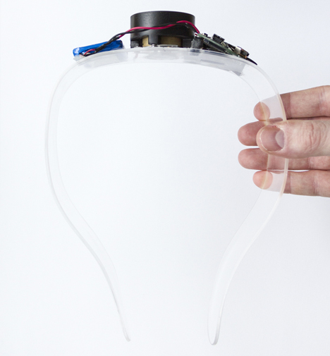 Headphones by Renaud Defrancesco transmit music across plexiglass band