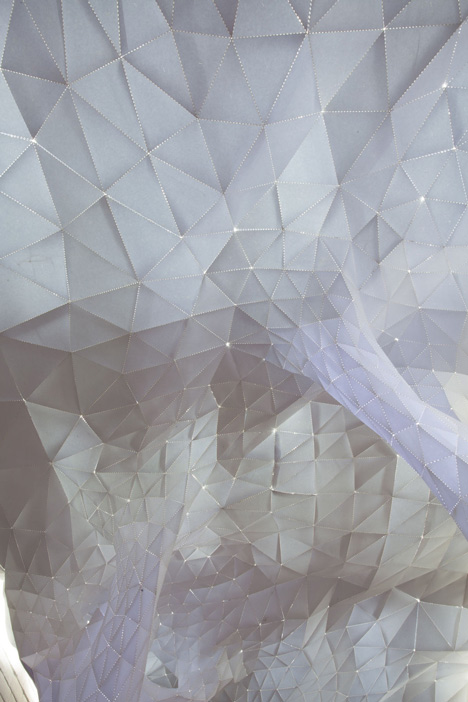 Glowing indoor forest made from paper by Orproject
