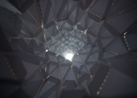 Glowing indoor forest made from paper by Orproject