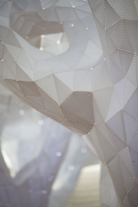 Glowing indoor forest made from paper by Orproject