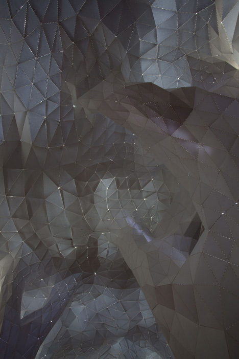 Glowing indoor forest made from paper by Orproject